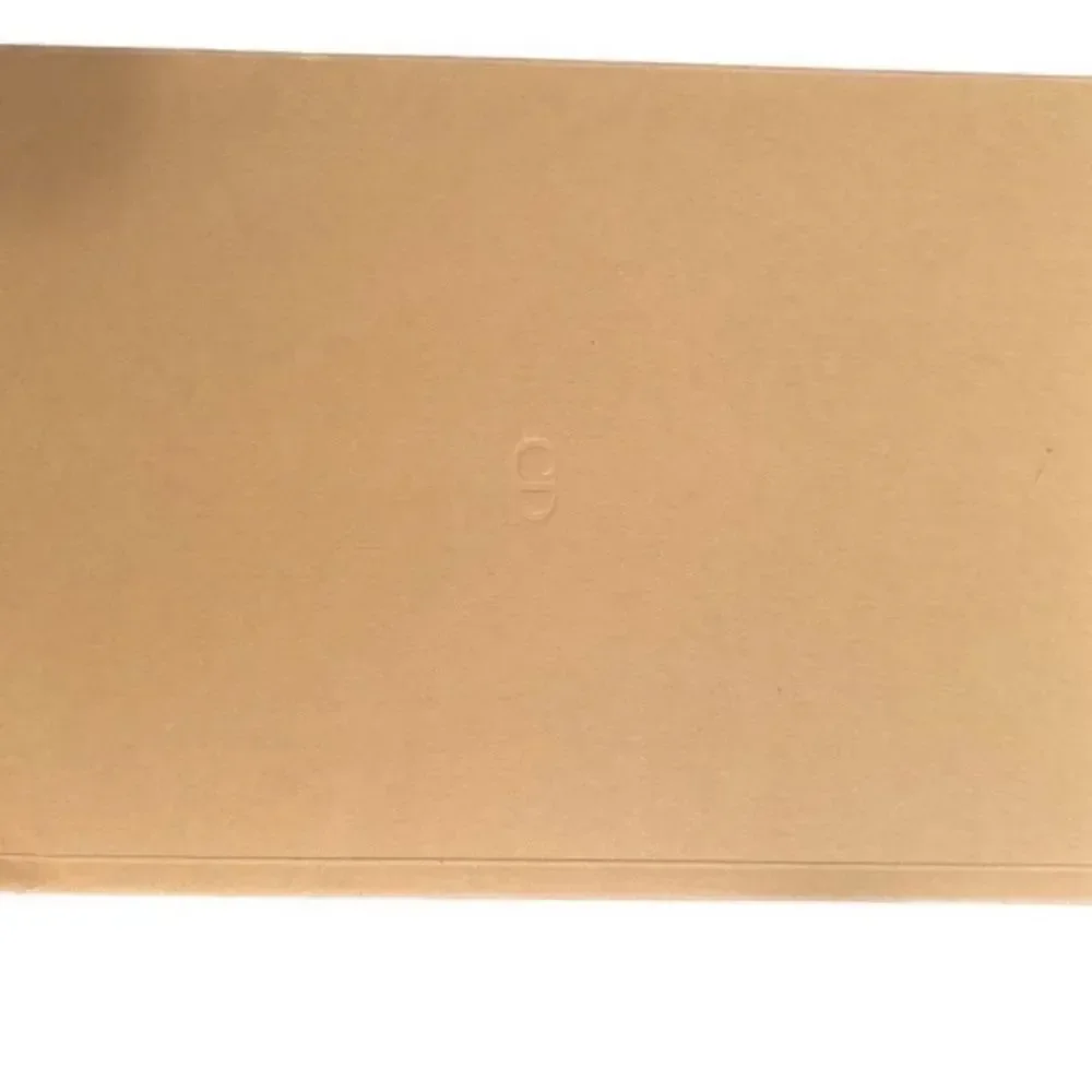 Christian Dior Tan Unlined Notebook.